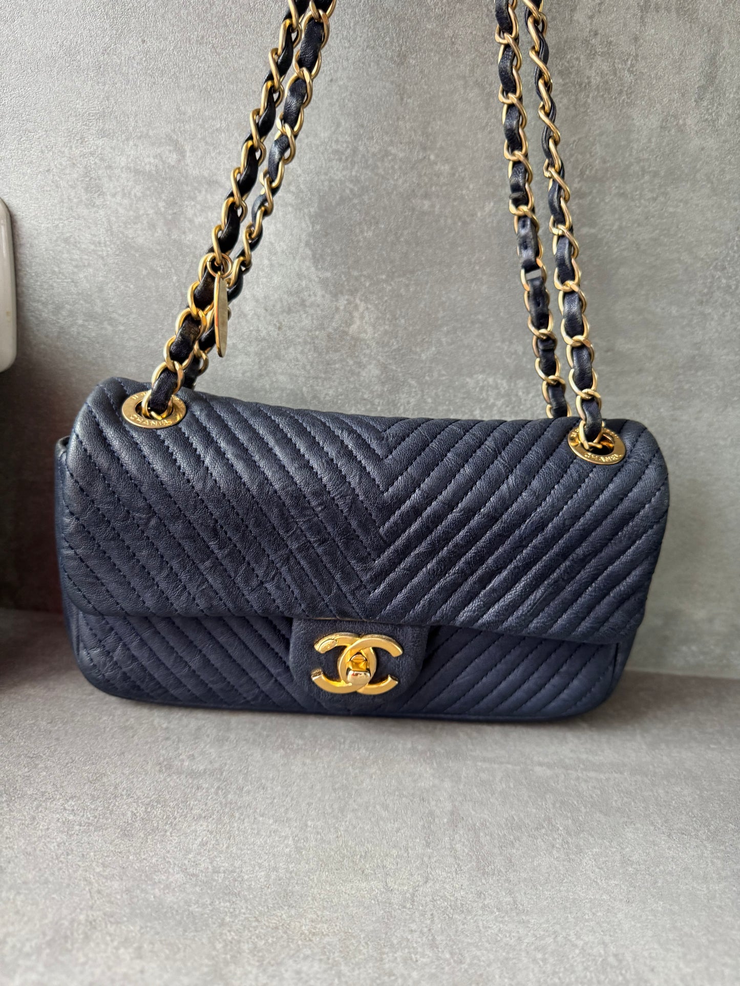 CHANEL Small Chevron Quilted Flap Bag in Navy Distressed Lambskin