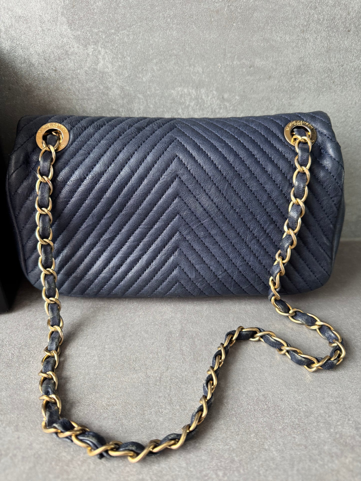 CHANEL Small Chevron Quilted Flap Bag in Navy Distressed Lambskin