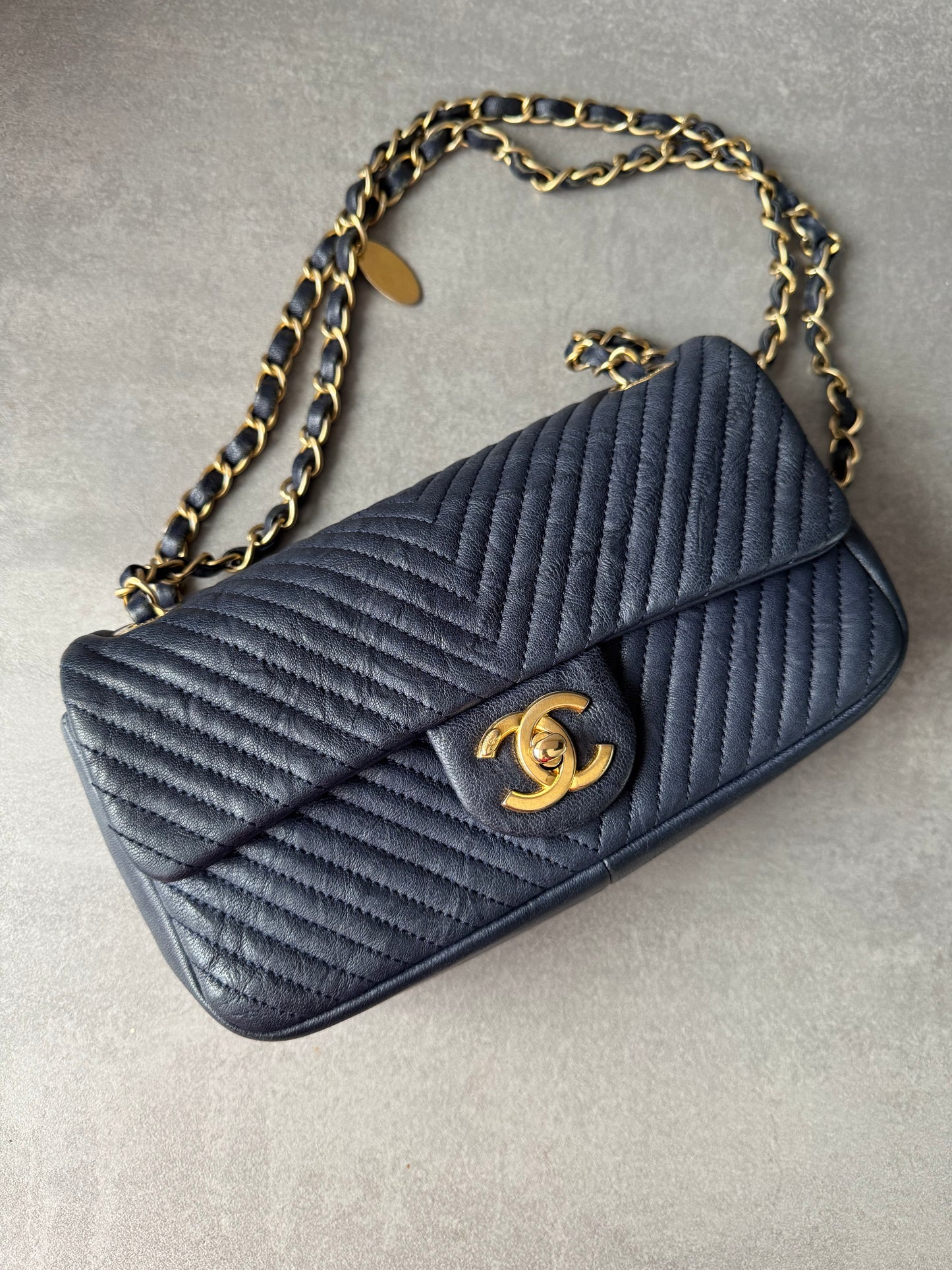 CHANEL Small Chevron Quilted Flap Bag in Navy Distressed Lambskin