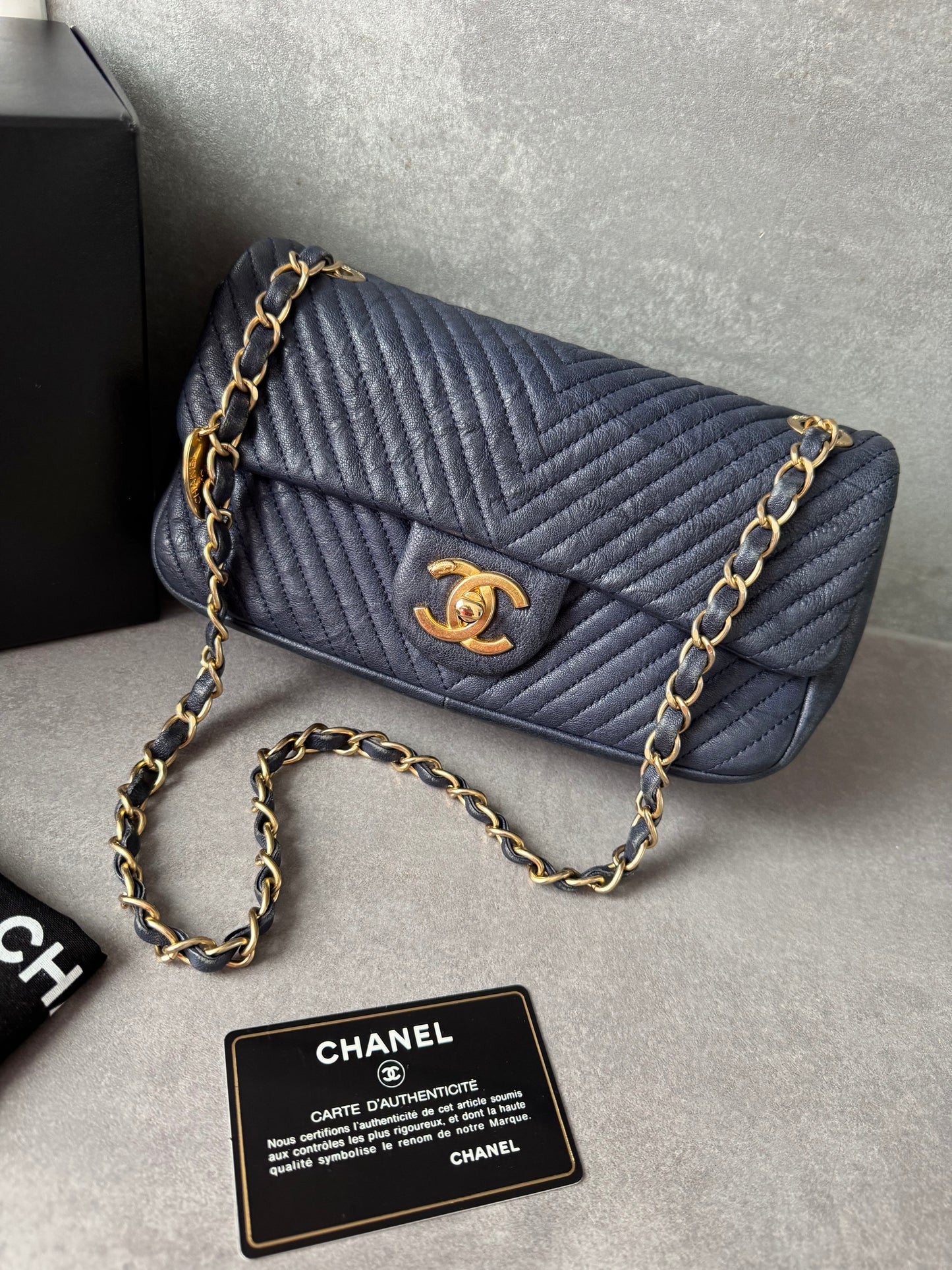 CHANEL Small Chevron Quilted Flap Bag in Navy Distressed Lambskin