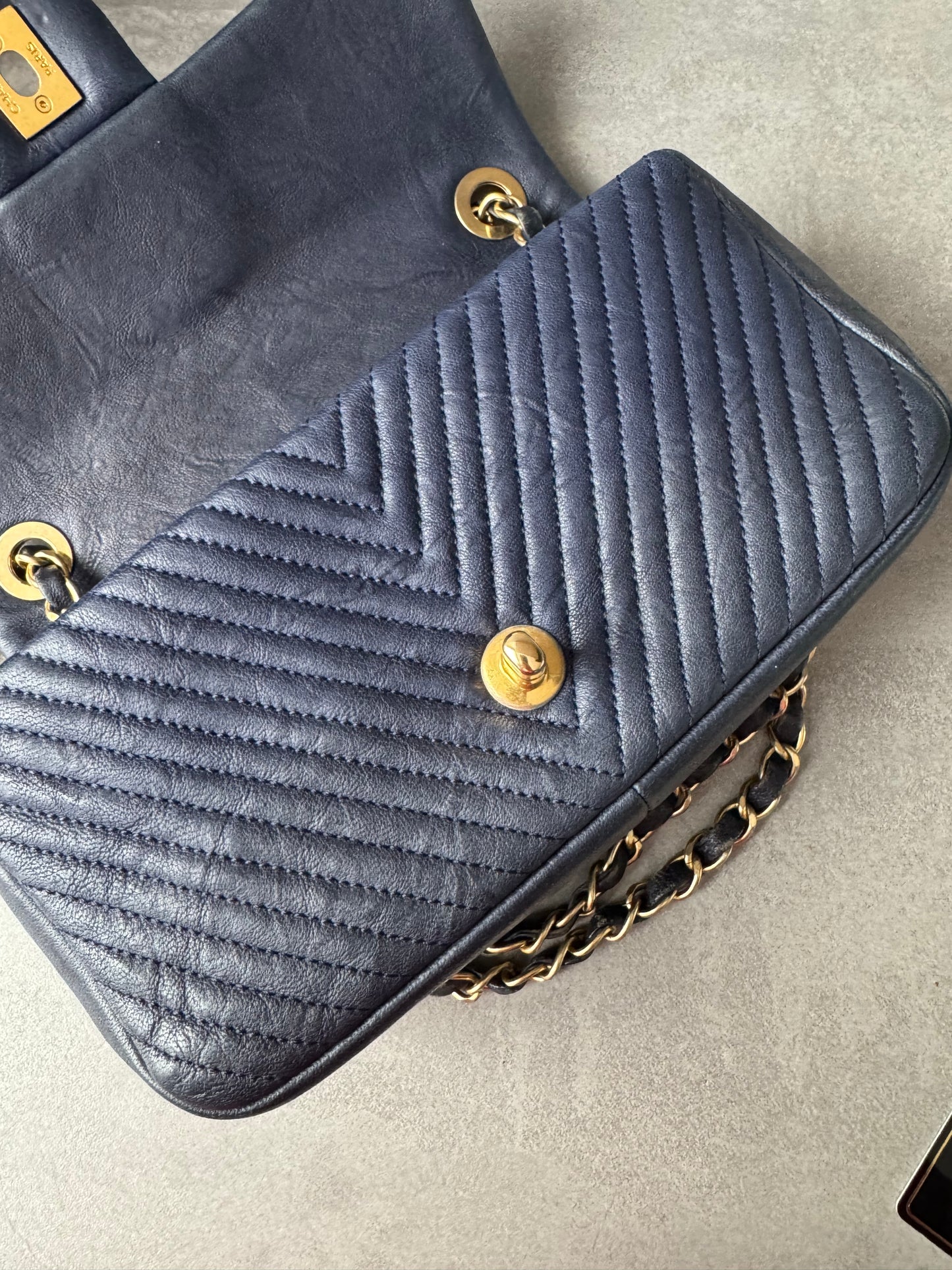 CHANEL Small Chevron Quilted Flap Bag in Navy Distressed Lambskin